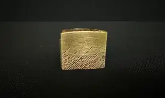Patterned brass habaki